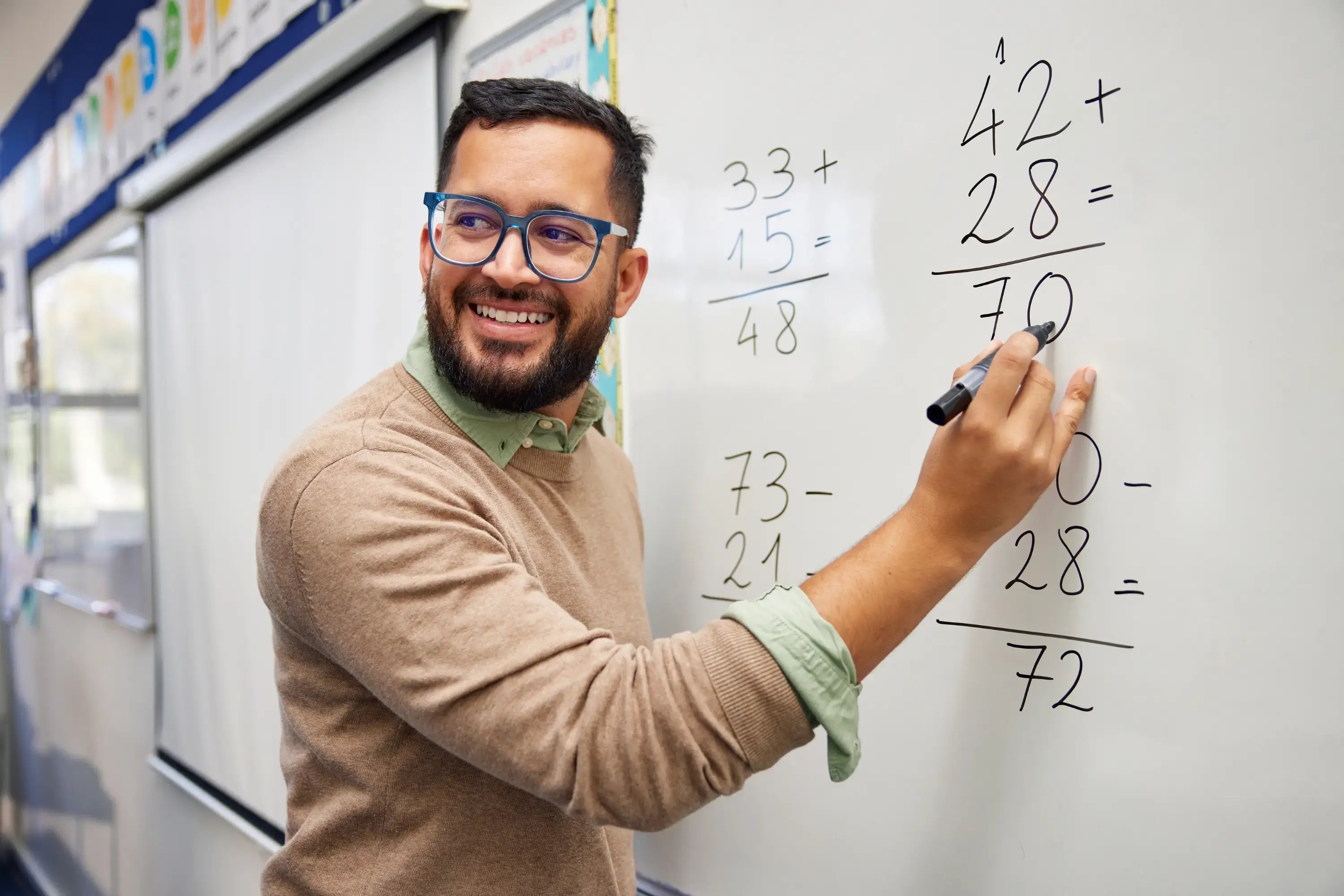 teacher-writing-on-the-whiteboard