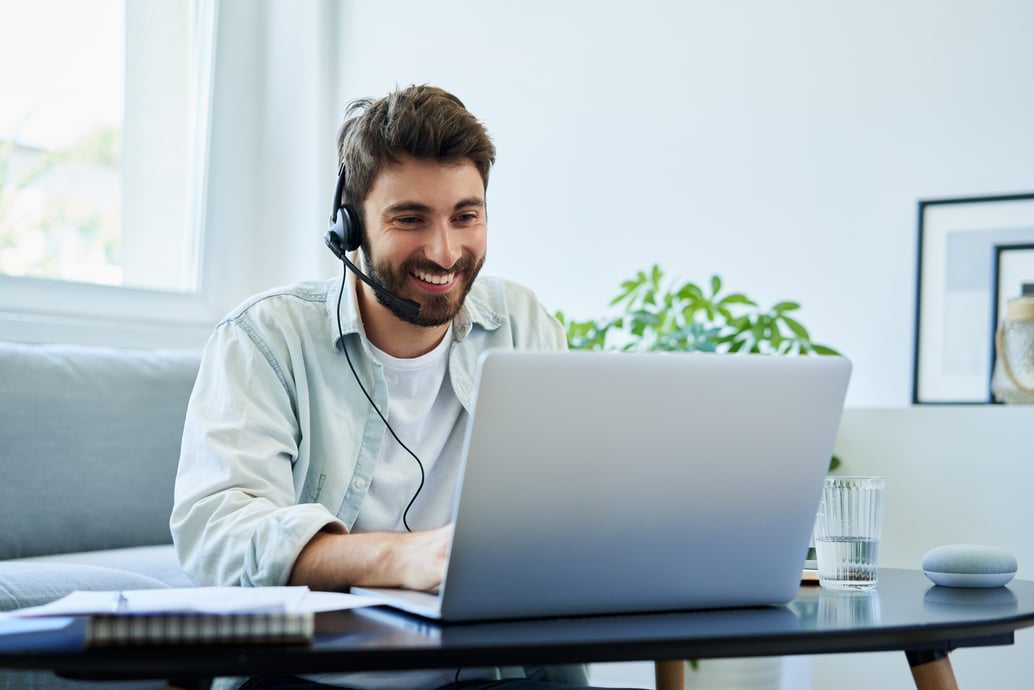 man on headset talking to someone